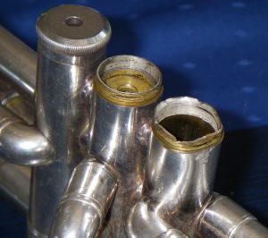 Damaged Yamaha trumpet valve section brought to Del Quadro Custom Trumpet for repair