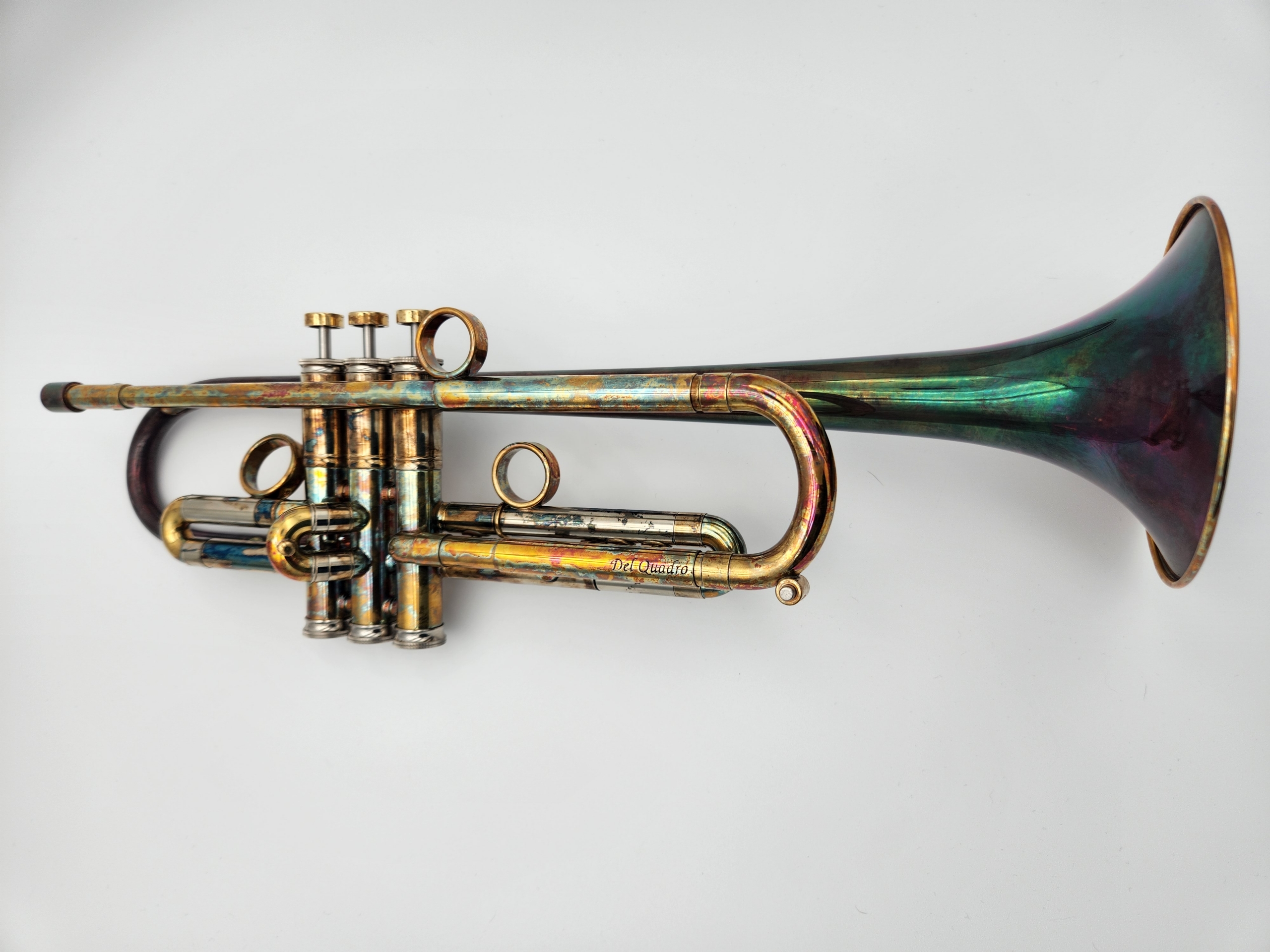 Del Quadro Custom Grizzly Trumpet in a Colorful Acid Burn Finish with Purple Chariot Button and Stopscrew Inlays