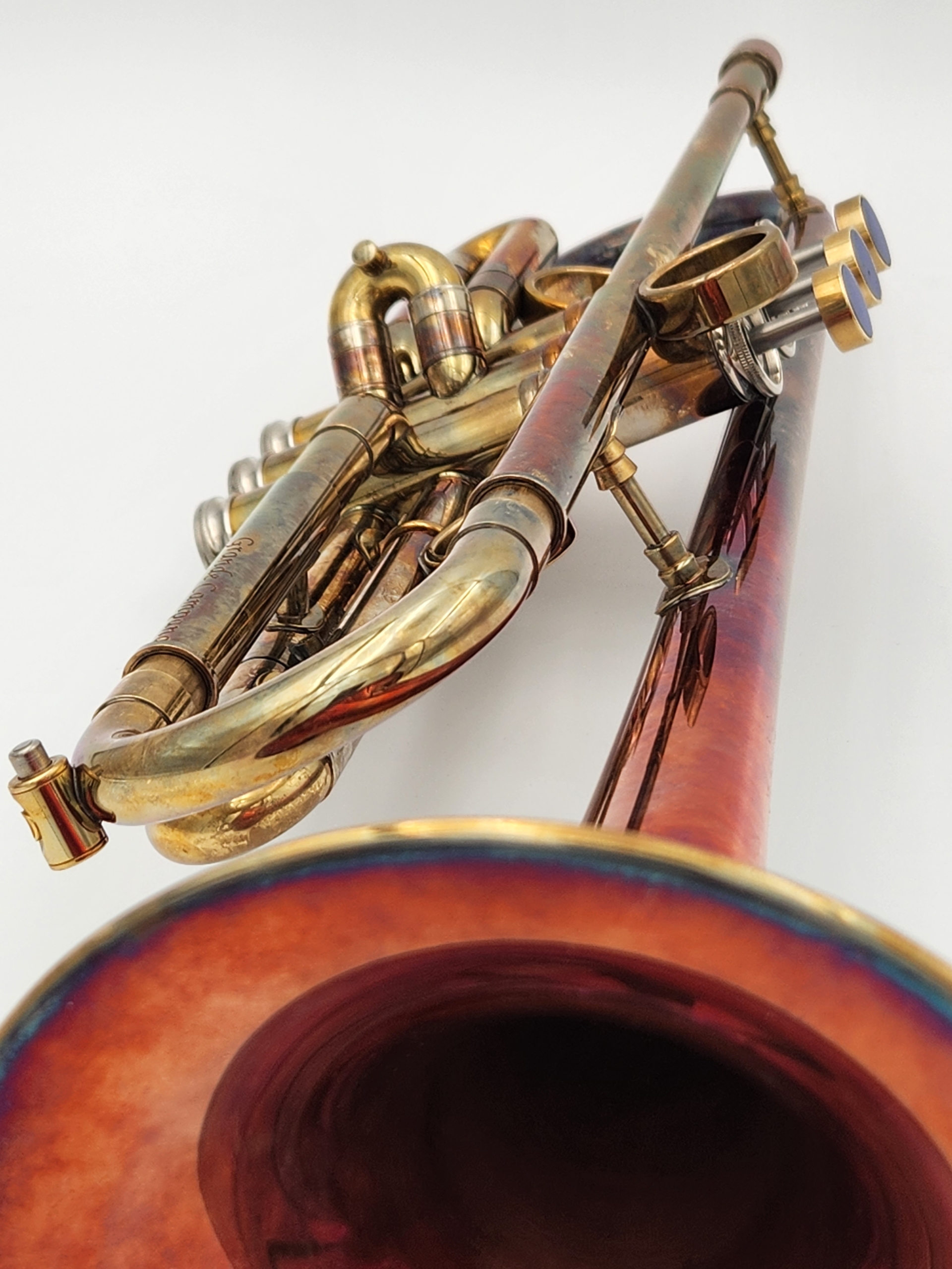 Del Quadro Custom Grande Campana trumpet with a 'I Spit Hot Fire' acid finish with lapis inlays